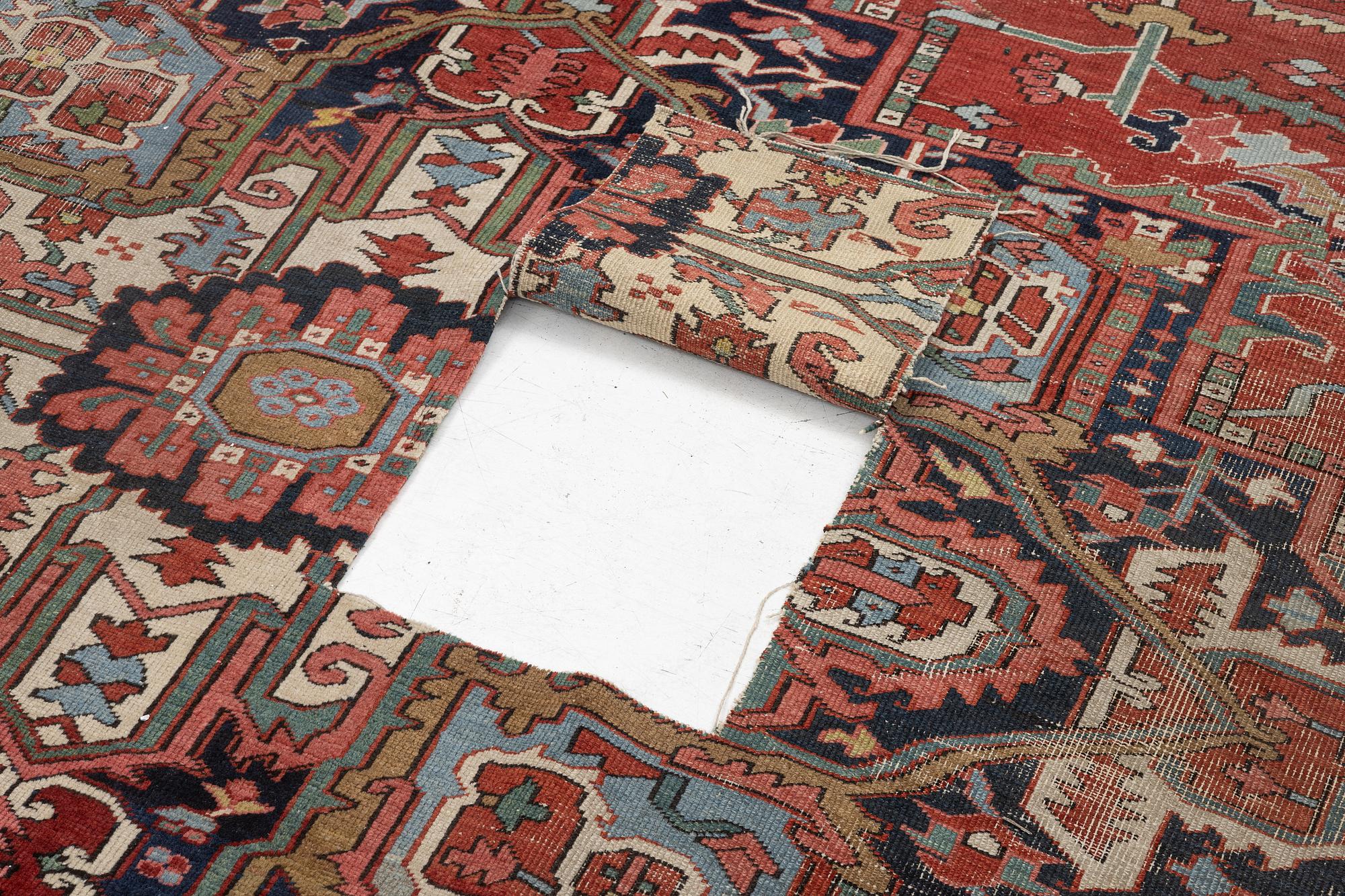 An Antique Heriz carpet, north west persia, c. 420 x 210 cm.