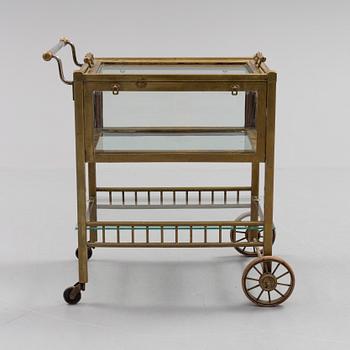 A early brass serving trolley.