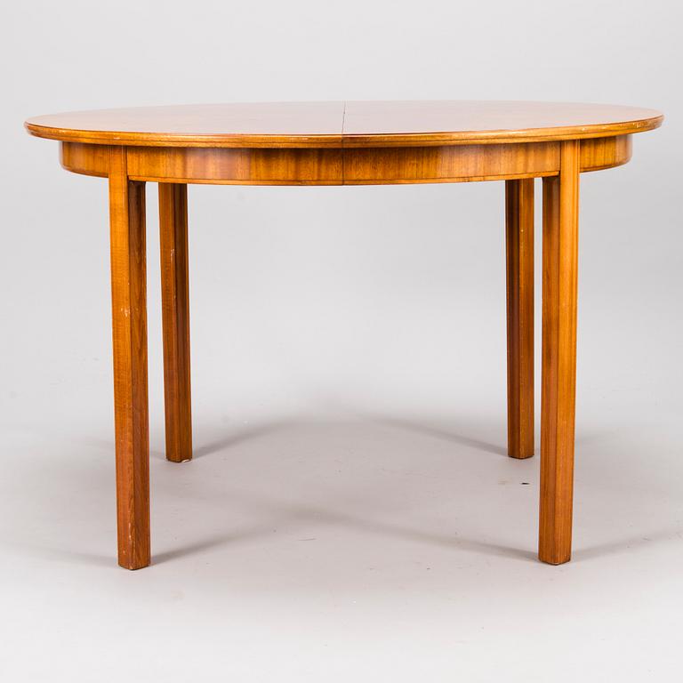 A 1940s-50s Dining Table.