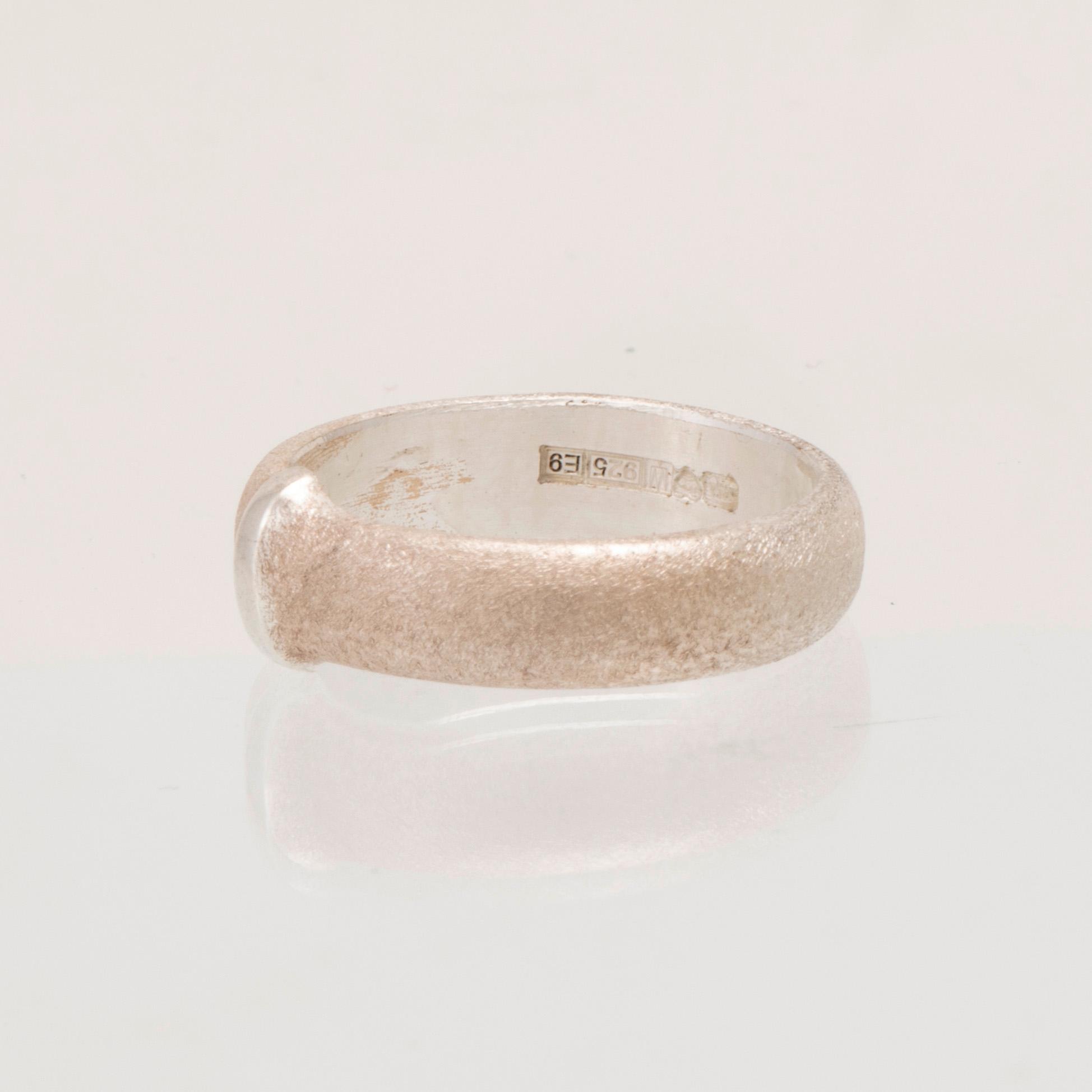 Zoltan Popovits brooch "Antares" in silver from 2002, as well as a silver ring from 2006, Lapponia.