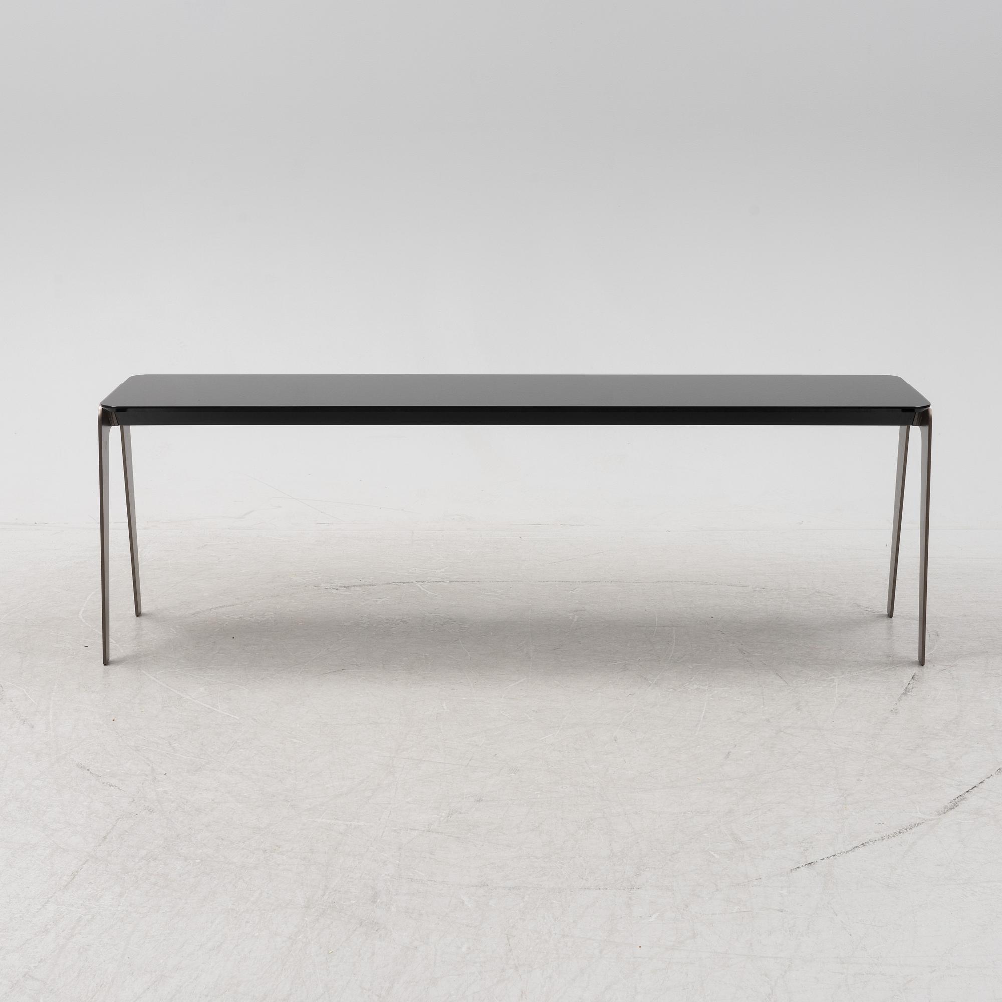 A 'Kirk' glass table by Rodolfo Dordoni for Minotti. 21st Century.