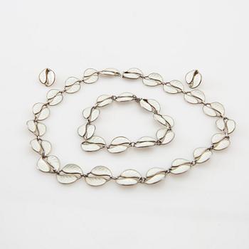 Willy Winnaess, Necklace, bracelet and clips of silver and enamel, for David Andersen Norway, mid/second half of the 20th century.