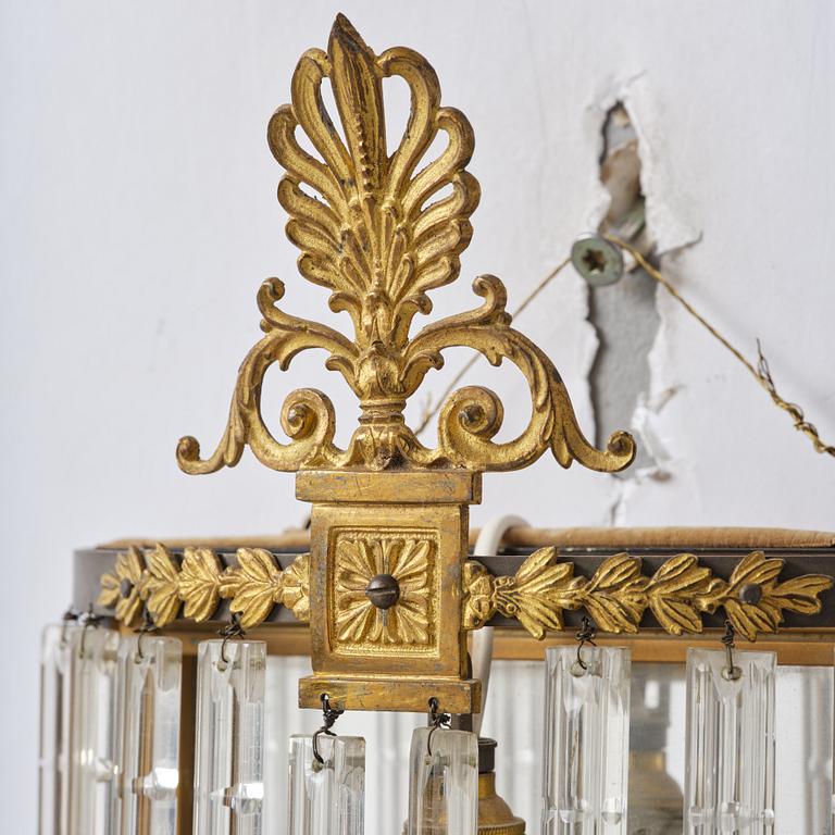 A pair of mirror sconces, 1910's/20's.