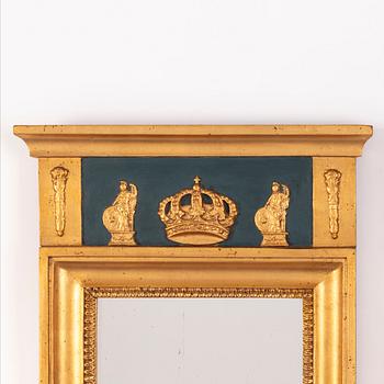 An Empire style mirror from around the year 1900.