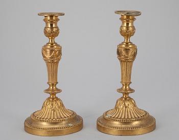 LJUSSTAKAR, ett par, förgylld brons, Frankrike/Ryssland 1800-talets mitt.