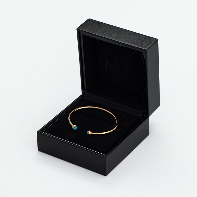 Piaget, A "Possession" bracelet made of 18K gold with turquoises. Marked Piaget R58367, 15.