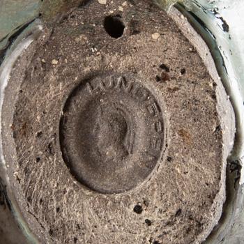 TYRA LUNDGREN, a stoneware sculpture of a bird.