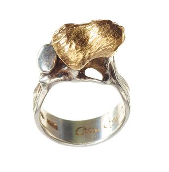 An Olle Ohlsson sterling pendant and a ring, Stockholm 1975 and 1988.