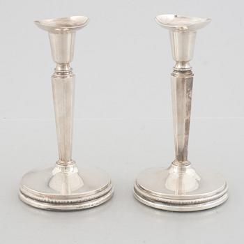 Two pairs of Swedish silver candlesticks, including Eric Löfman, MGAB, Uppsala 1979-1982.