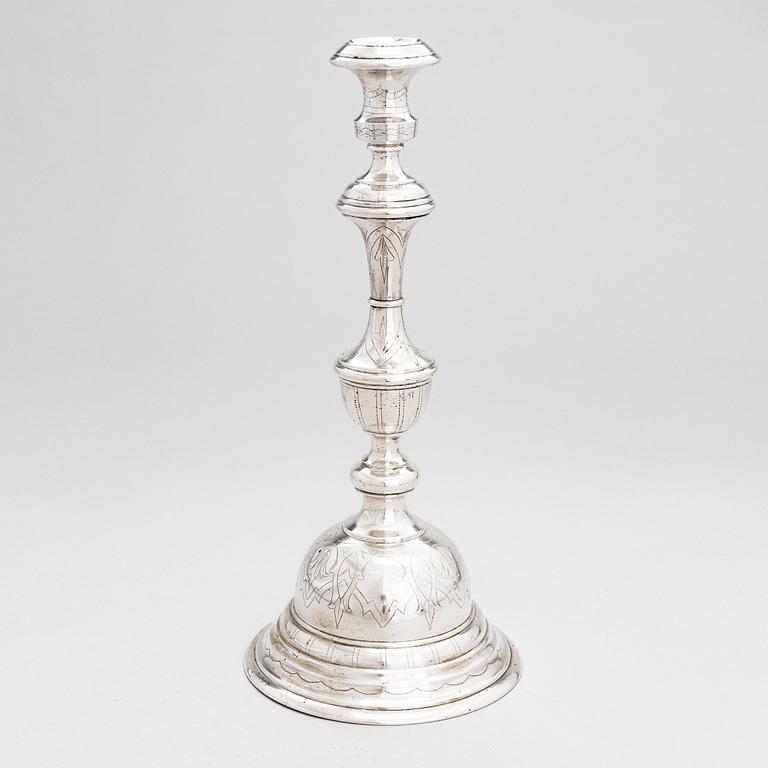 A Viennese silver candlestick, maker's mark CW, Austro-Hungarian Empire 1872-1922.