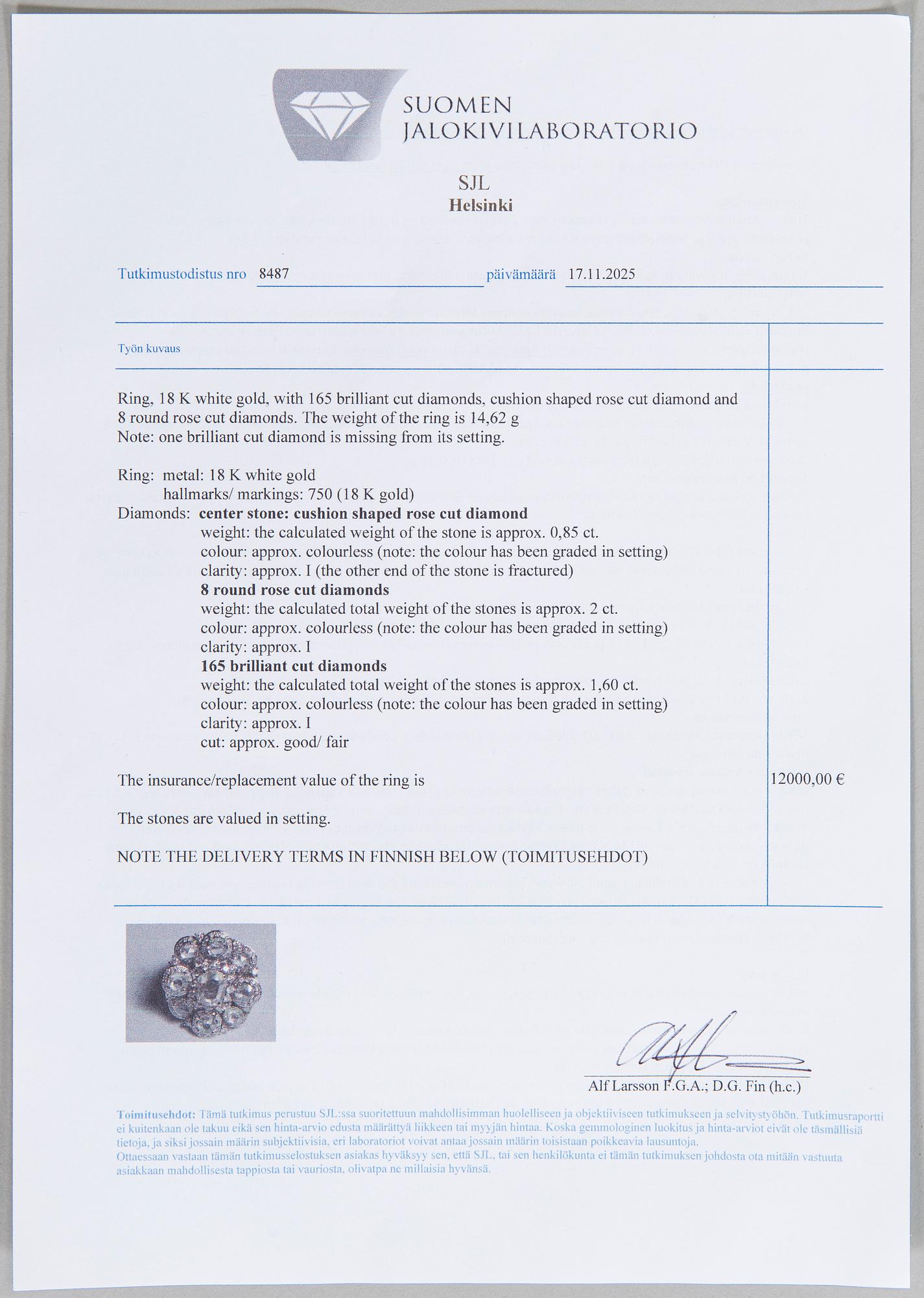 An 18K white gold ring set with rose-cut and brilliant-cut diamonds.