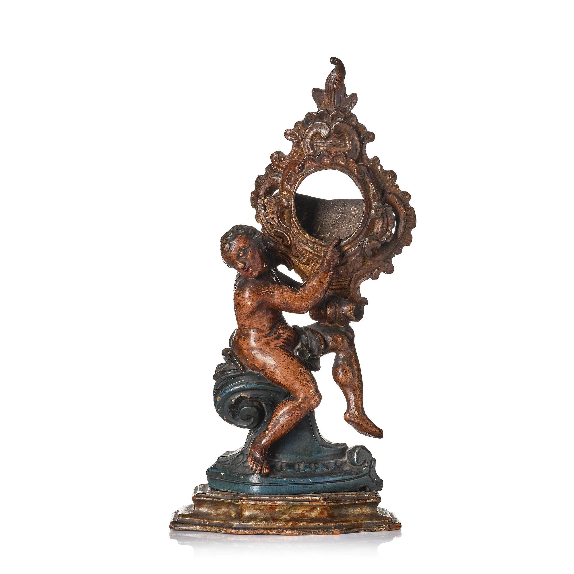 A Northern-European rococo carved pocket-watch holder, later part 18th century.