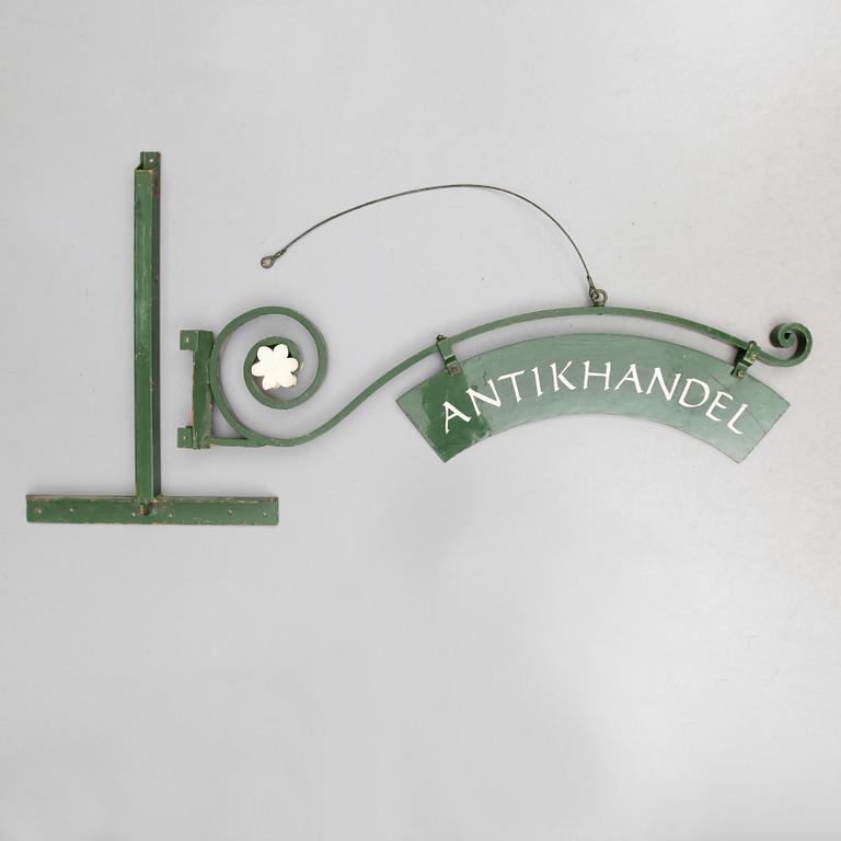 BUTIKSSKYLT, 1900-talets andra hälft.