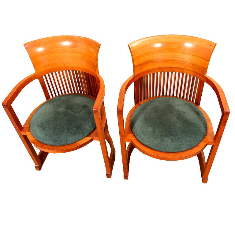 Frank Lloyd Wright, a pair of Barrel chairs model no 606 for Cassina numbered and dated 1986.