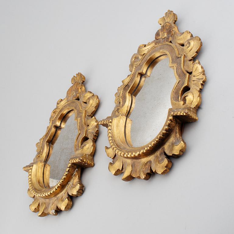 A pair of Louis XV mirrors from the 18th century.