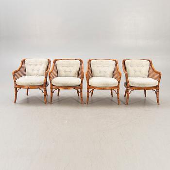 A set of four imitated bamboo and rattan easy chairs later part of the 20th century.