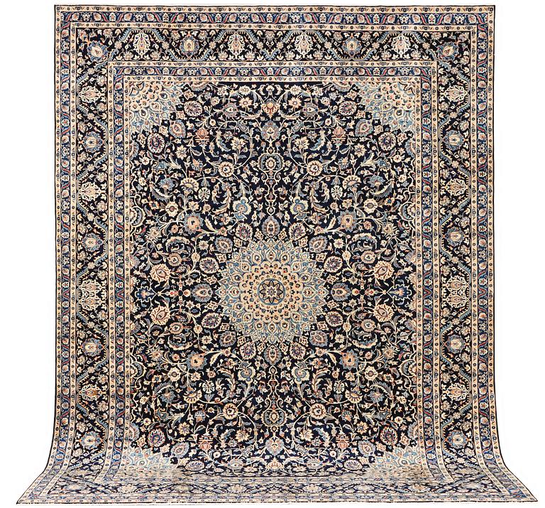 A Keshan carpet, c. 392 x 290 cm.