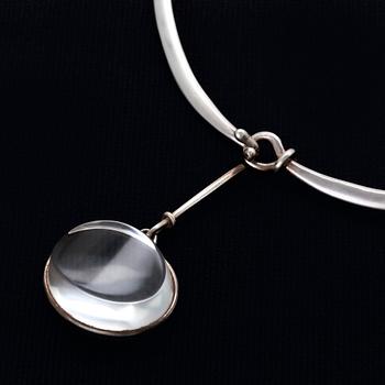 Vivianna Torun Bülow-Hübe. Necklace with pendant, sterling silver and rock crystal or glass.