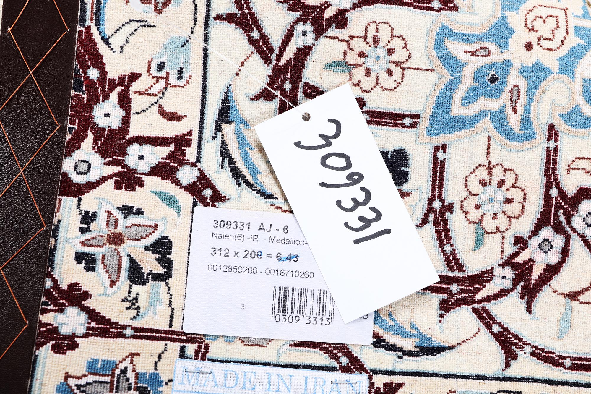 A carpet, Nain, part silk, 6 Laa, ca 312 x 208 cm.