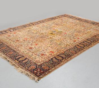 A CARPET, a semi-antique Tabriz probably, figural, ca 325,5 x 226 cm.