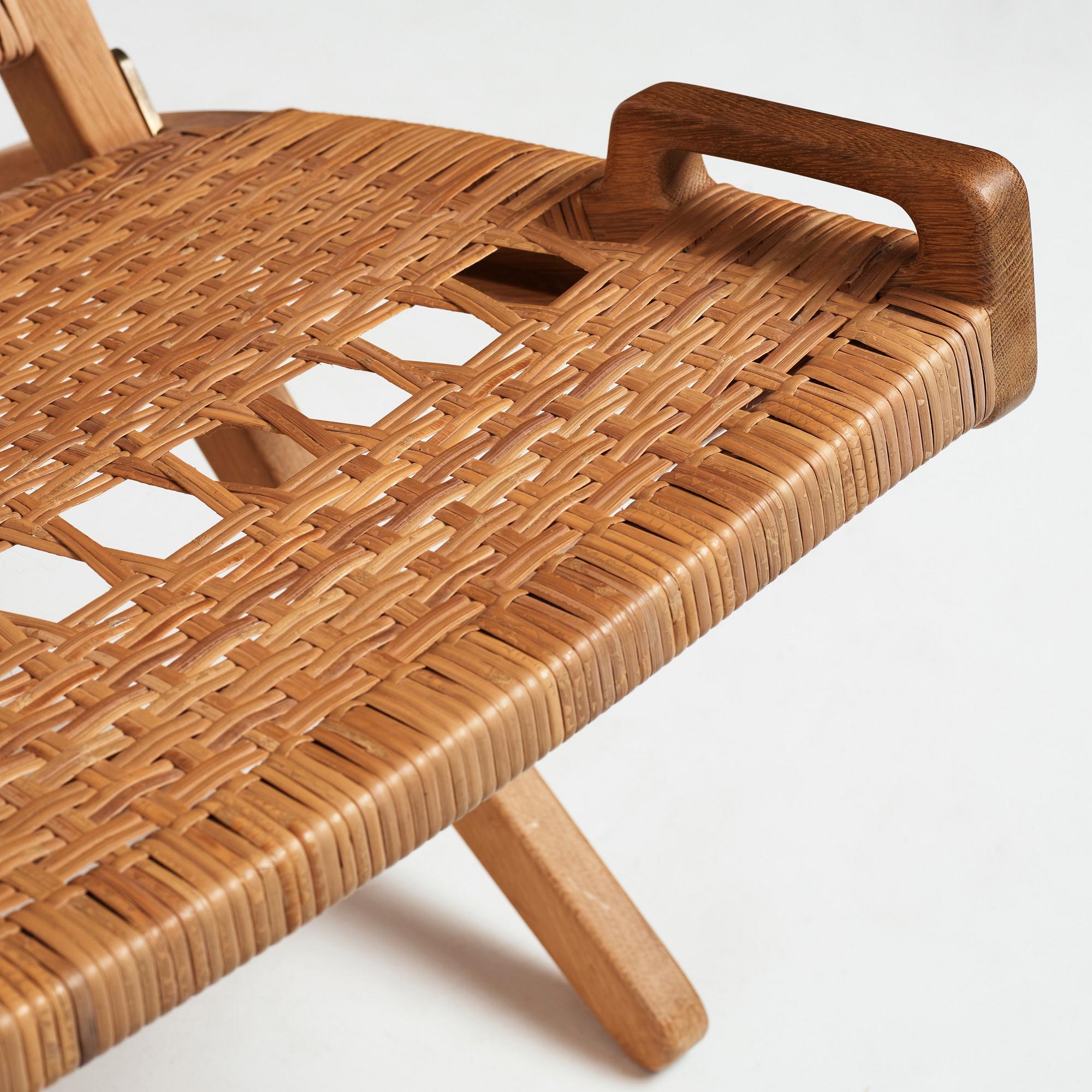 Hans J. Wegner, a pair oak and rattan "model 512" folding chairs by Johannes Hansen, Denmark 1950-60's.