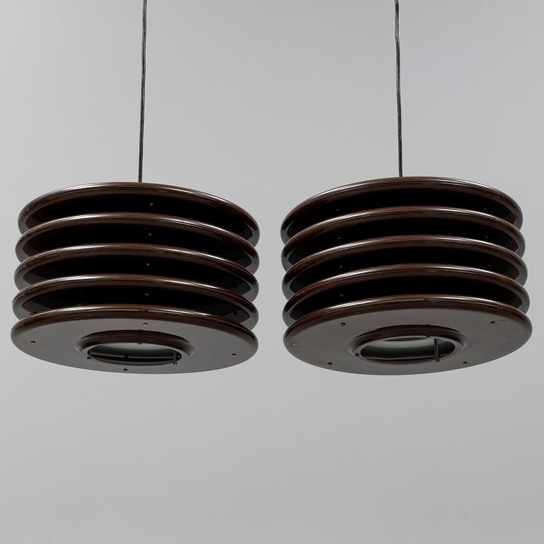 A par of 1970's ceiling lights.