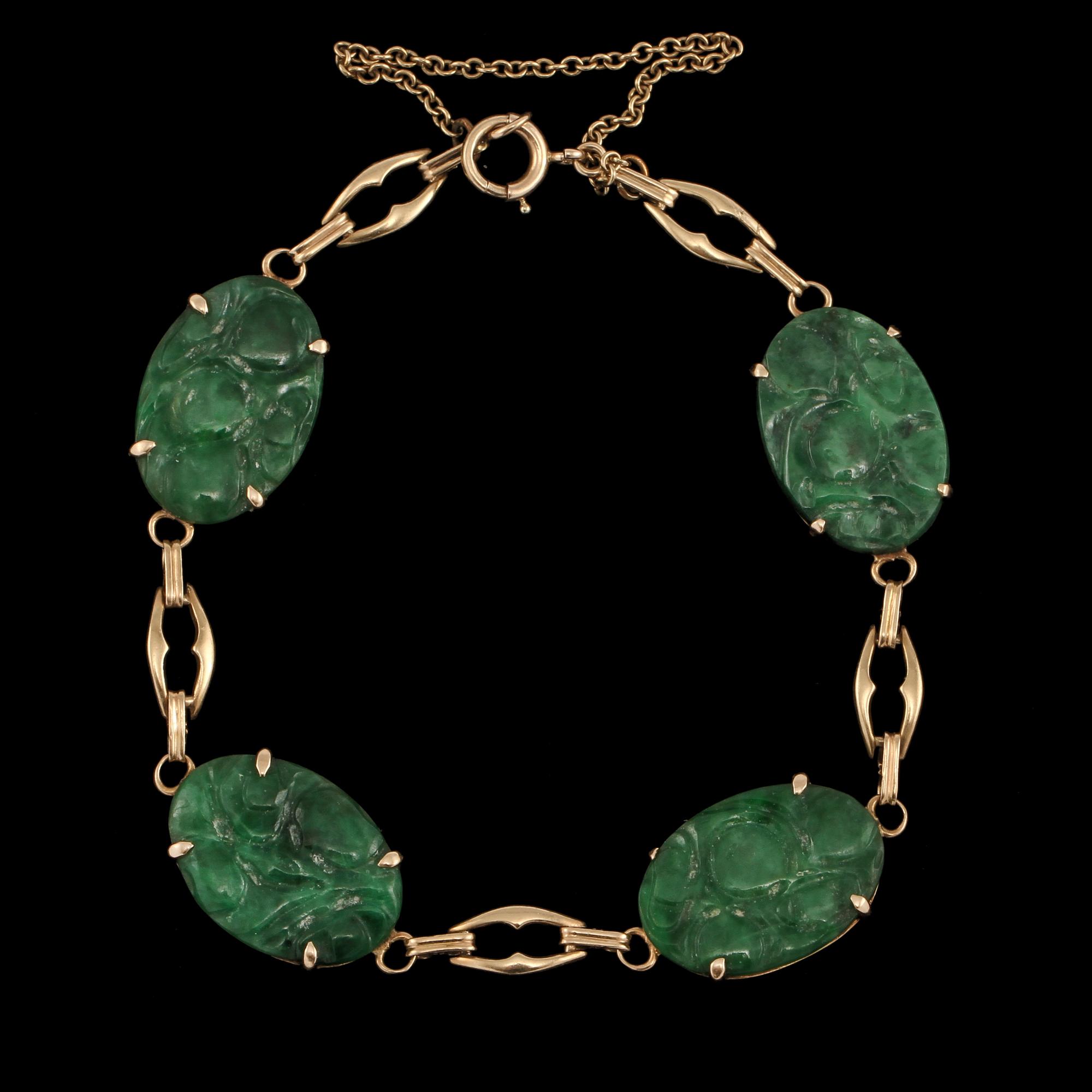 ARMBAND, 14k guld med skuren nefrit, omkring 1900-talets mitt. Vikt 7 g.