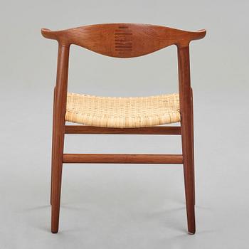 HANS J WEGNER, a teak, oak and cane "Cowhorn chair", JH 505, Johannes Hansen, Denmark 1950-60's.