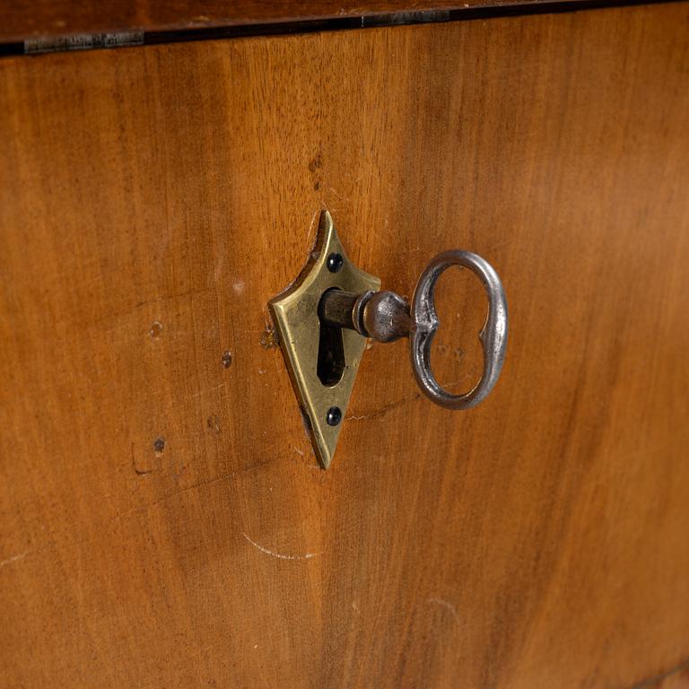 A mahogany veneered secretaire by Daniel Sehfbom, Stockhom 1800-1837.