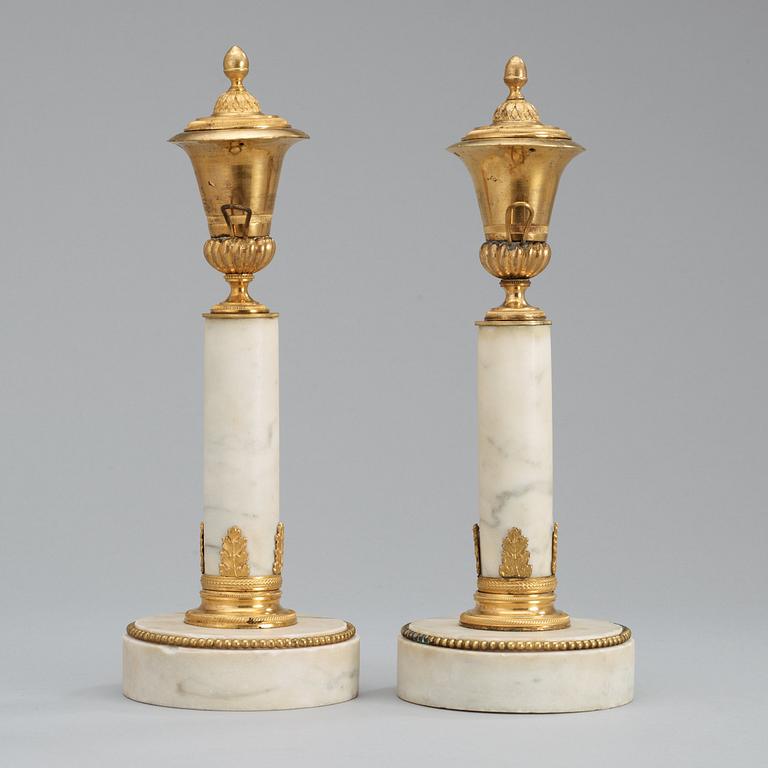 A pair of late Gustavian late 18th century cassolettes.