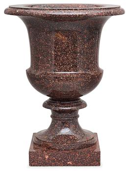 640. A Swedish Empire 19th century porphyry urn.
