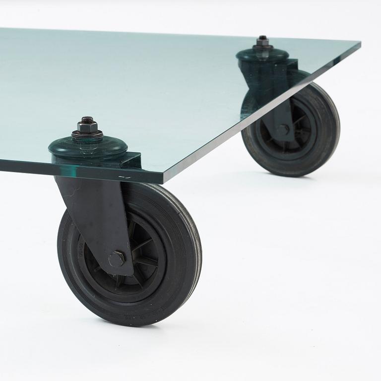 A Gae Aulenti sofa table 'Tavolo con Ruote', Fontana Arte, Italy.