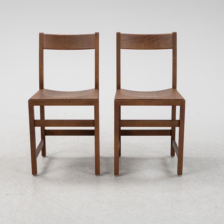 A pair of stained beech 'Waiter Chair' by Chris Martin for Massproductions.