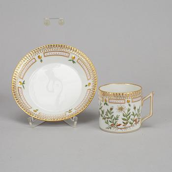 A set of three plus one porcelain "Flora Danica" coffee cups and saucers, "Royal Copenhagen, Denmark.