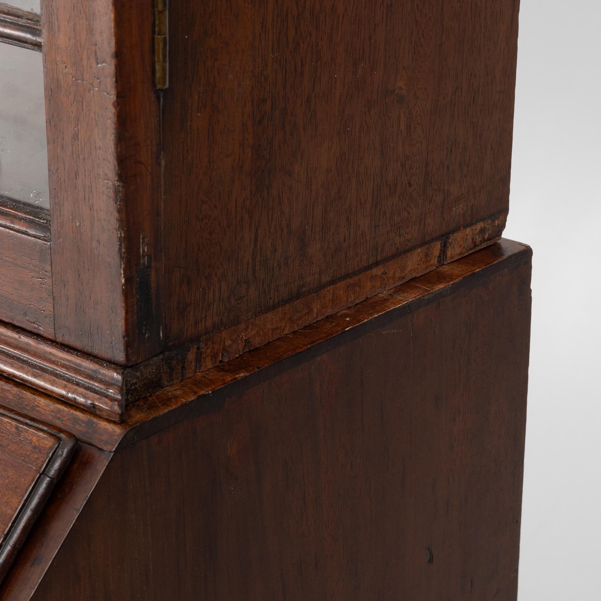 An English mahogany cabinet, 19th Century.