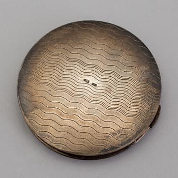 a russian silver powder compact from the first half of the 20th century.