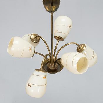 A mid-20th-century brass ceiling light, Finland.