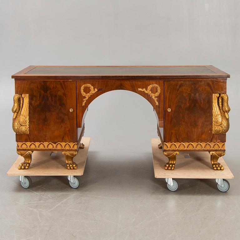 An Empire style mahogany desk 20th century.