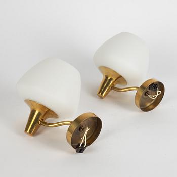 Harald Notini, a pair of model "8721" wall lamps, Arvid Böhlmarks Lampfabrik, Sweden, 1950's.