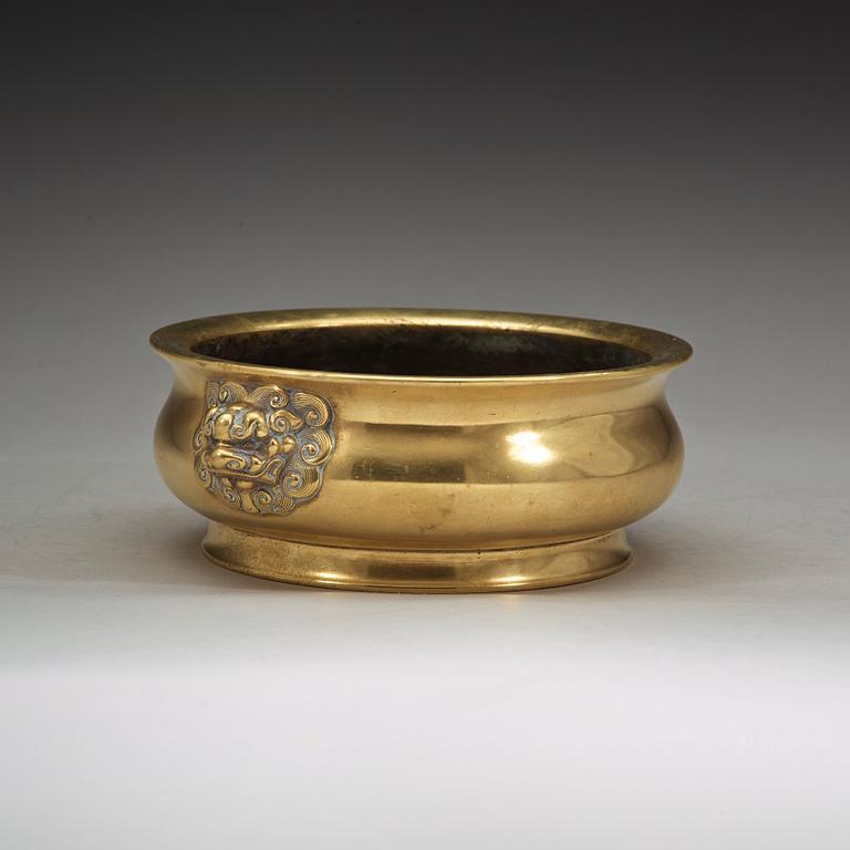 A polished bronze censer, Qing dynasty with Xuandes six character mark.