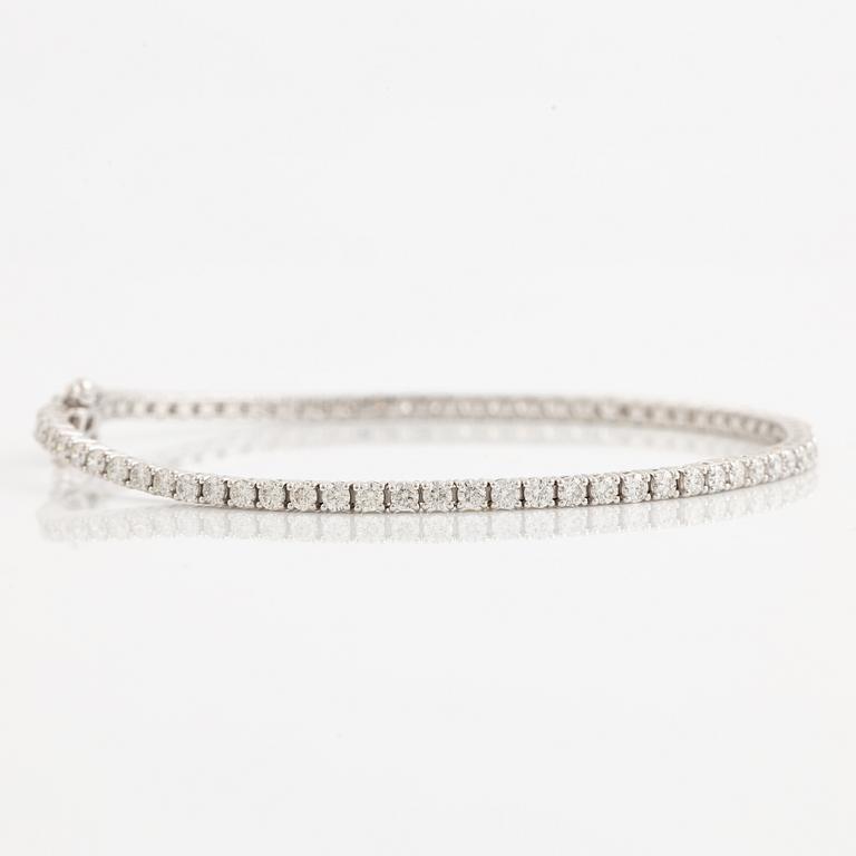Tennis bracelet 18K white gold with brilliant-cut diamonds.