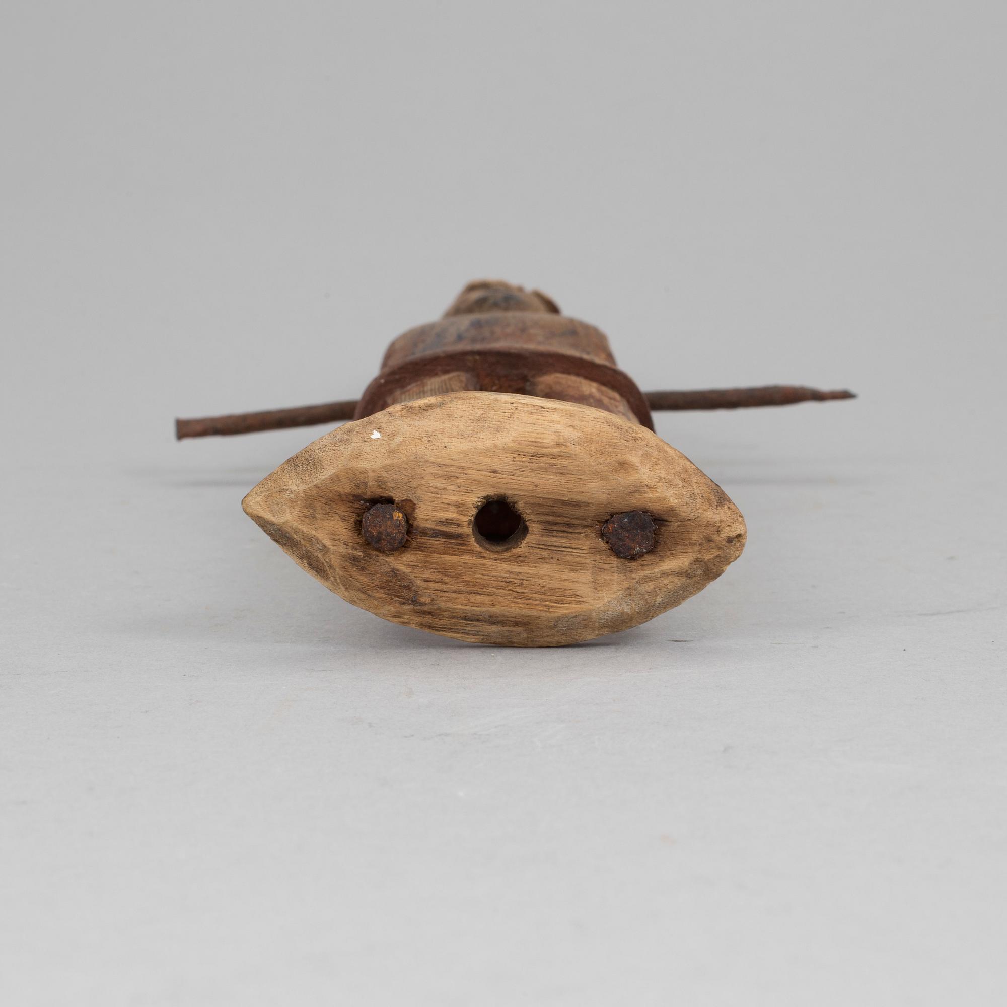 A wooden tool/sculpture, ca 1850.