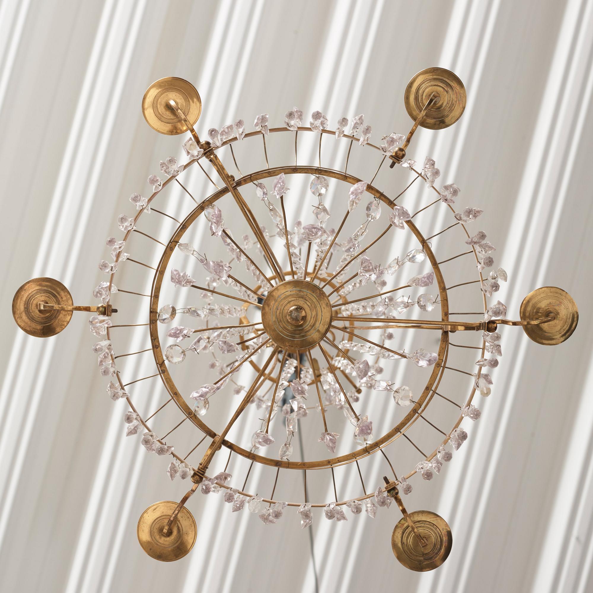 A late Gustavian gilt brass and cut glass seven-branch chandelier, Stockholm, late 18th century.