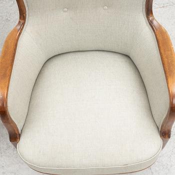 A pair of similar Swedish Modern armchairs, mid 20th century.