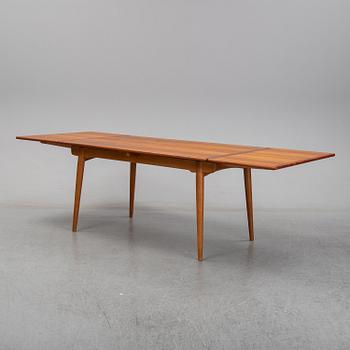 Hans J Wegner, a teak dining table, Andreas Tuck, Denmark.