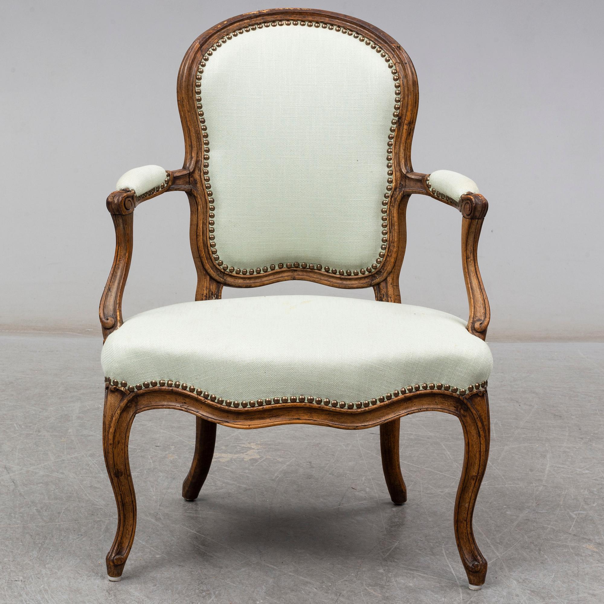 A French 18th century Louis XV armchair.
