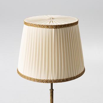 A brass floor lamp, 1940s.
