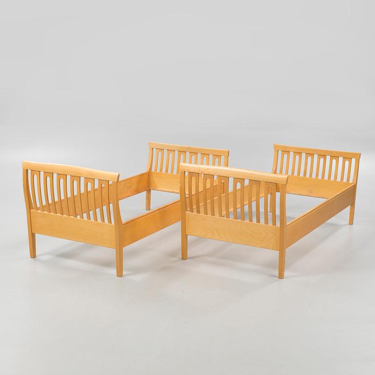 A pair of beds by Carl Malmsten for Åfors Möbelfabrik, second half of the 20th century.