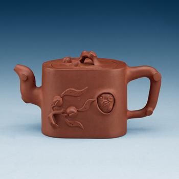 A Chinese Yixing tea pot with cover, 20th Century.