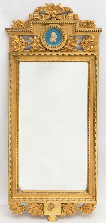 A Gustavian style mirror by John Lundmark, early 20th Century.